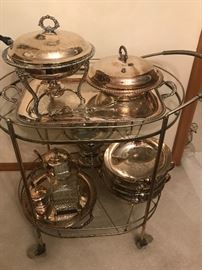 Vintage tea cart and a variety of silver plate items. 
