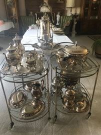 Tea cartsand silver plate serving items. 