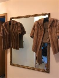 Vintage Ladies furs and a large wall mirror 
