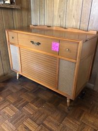 Circa 1960 Airline Stereophonic stereo and turntable in a colonial style cabinet.