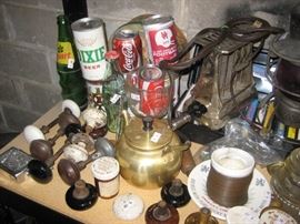 Vintage beer and Coke cans, doorknobs, 1930's toaster, and more.