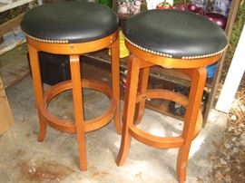 A pair of bar stools in excellent condition.