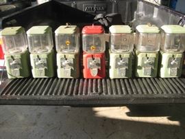 Vintage Acorn gumball machines - seven of them.