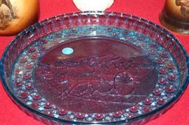 11inch blue pattern glass tray depicting stubborn mule with wagon stuck on tracks with a train approaching