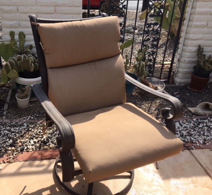 Brown Metal Swivel Arm Chair