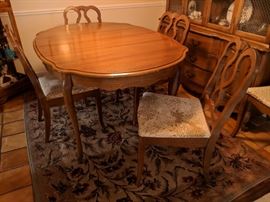 $150  Dining room table with chairs and leaf