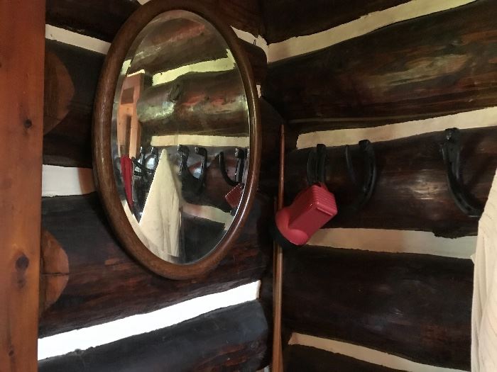 Horseshoe hooks, old mirror