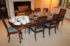 Ethan Allen dining table with 2 leaves, table pads, and 6 chairs