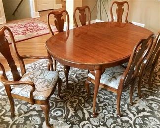 68”L x 44w x 29h Oval Thomasville Cherrywood Spoonfoot Dining Table with (2) 20” wide leaves
4 Straight back newly Upholstered Seat Chairs
2 Arm Chairs 
