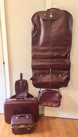 1970s American Tourister 5 piece ox blood luggage set