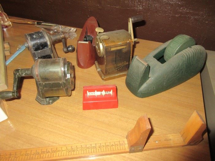 Vintage pencil sharpeners and tape dispensers 