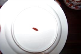 Mark on base of plate