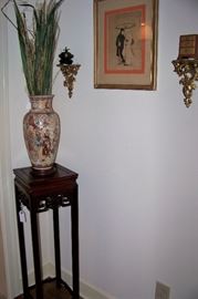 One of a pair of oriental vases, stands