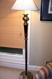 One of a pair of floor lamps