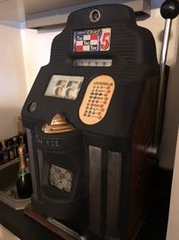 ta da  -how cool  is this baby !!    not cheap but how many of these do you see !!jennings chief .5cent antique slot  machine  w/ the key 