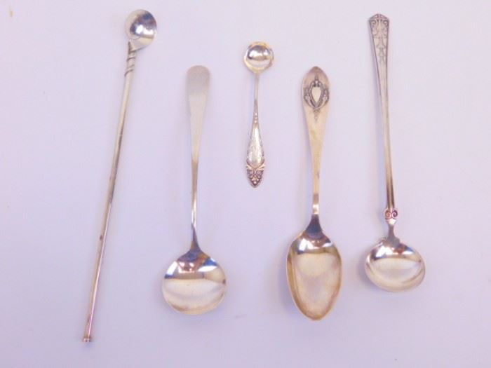 5 assorted sterling spoons.