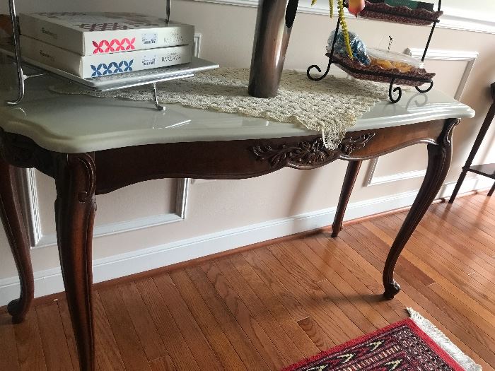Mohogany tables with marble tops