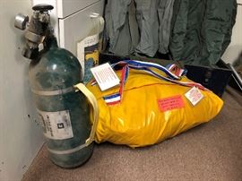 Airplane Raft in bag, and Airplane Oxygen Tank