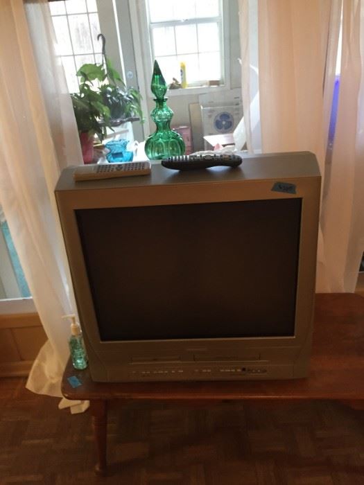 TV with built-in DVD/VHS player.