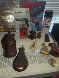Handgun grips, Colt gun powder flask, holster, Shooter's Bible, & more.
