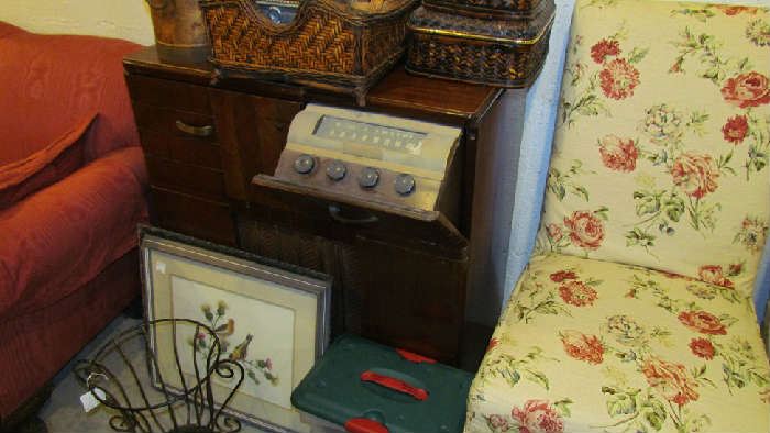 Funky hi-fi and radio cabinet, circa late 40's to mid 50's.  Not in playable condition, but in today's world, they are being converted to other uses, such as cocktail cabinets and pet houses.