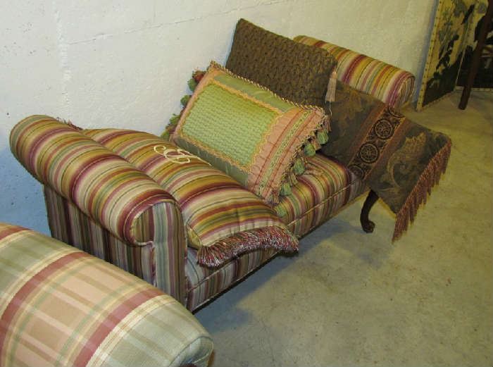 Settee in fine condition, along with a pillow collection.
