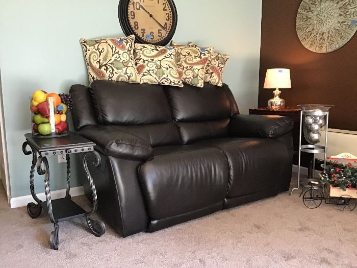 Genuine leather power recline love seat.  Only 2 years old, like new.  Also, has 3 years left on warranty that covers everything.  