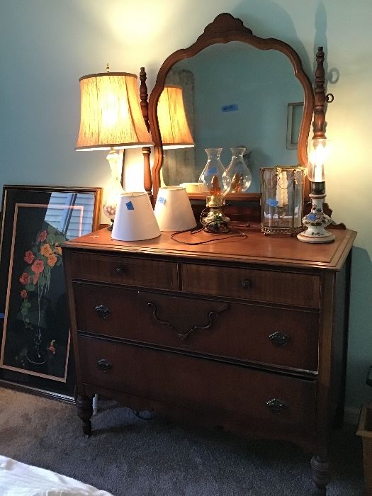 Antique dresser and mirror with wood wheels.  In great shape