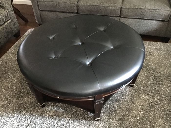 Awesome leather coffee table, area rug
