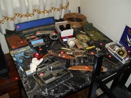 What an odd assortment of collectibles and musical instruments.