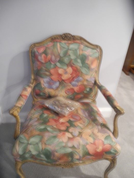Lovely print chair with wooden arms and legs