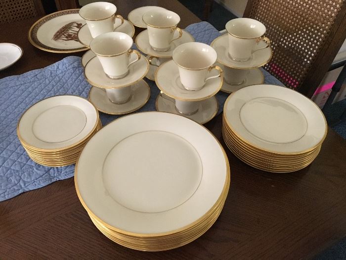 Lenox “Eternal” classic gold rimmed ivory chine. Five piece place setting.  Service for 8 with Large Platter and a few extra pieces.