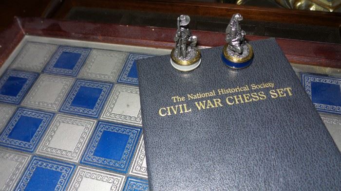2 chess sets.  1 Civil War and 1 carved wood
