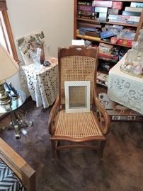 Rocking chair caned back and seat.