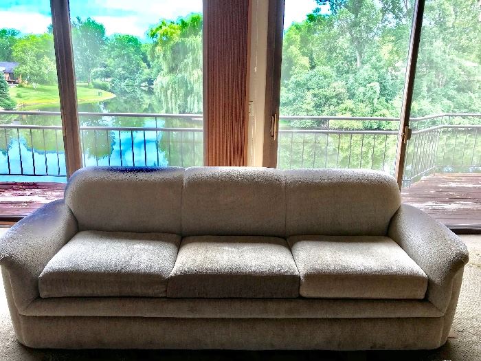 There are two of these stunning Thayer Coggin couches available!  Deep creme in color with variations.