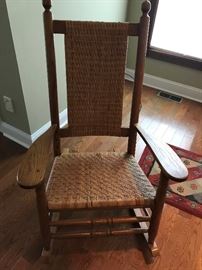 Antique wicker arm chair rocking chair