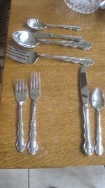 Reed & Barton stainless- ' Summertime' - 7 knives, 7 forks, 4 salad forks,5 teaspoons, cold meat fork , butter knife, 2 serving spoons, gravy ladle