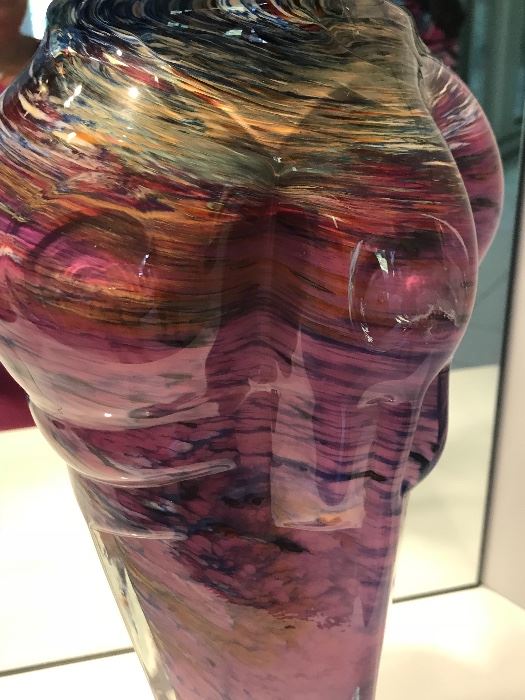 Damage on art glass vase. 