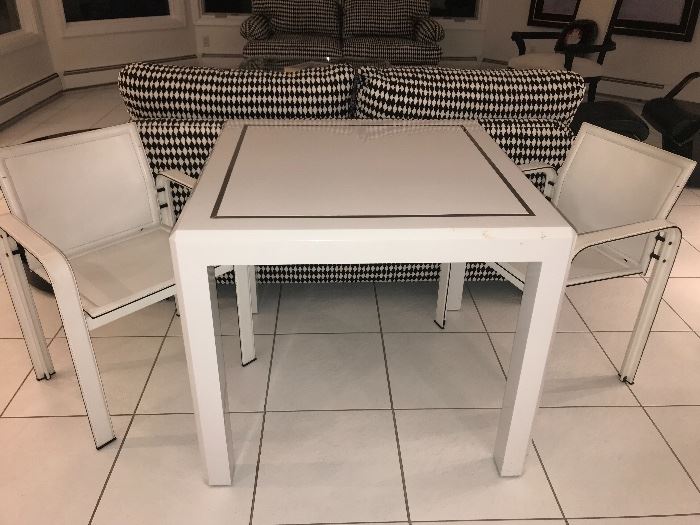Matteograssi  (Italy) pair of chairs and a contemporary white square table 