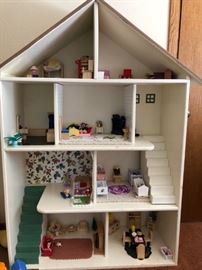 Large dollhouse with furniture. 