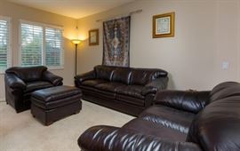 leather sofa and chairs. Rug and art on the walls are not for sale!