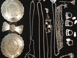 Concho belt, Sterling rings, necklaces, crosses, earrings, charms, pendants