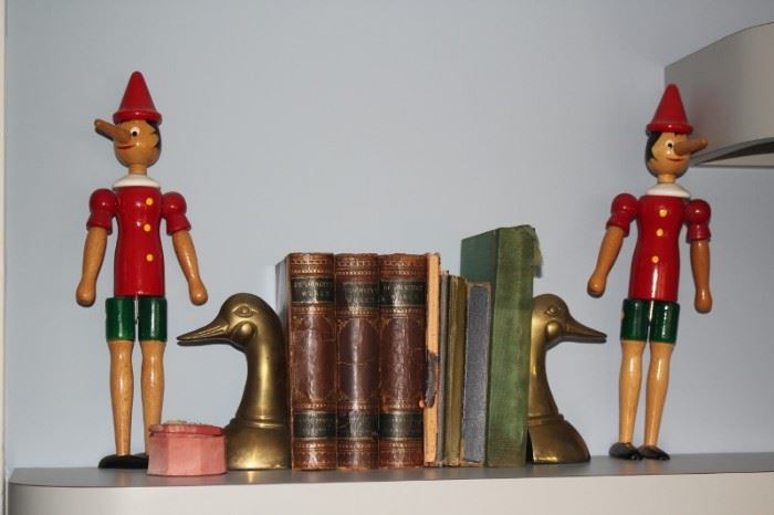 Pair of Pinocchios and Goose Bookends with Antique Books