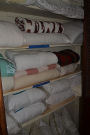 Pillows, blankets, bed linens