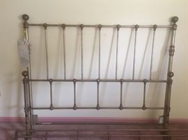 Iron bed with brass finish by Hooker.