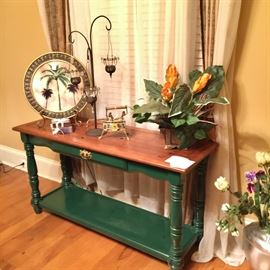 Green console table and decorative items