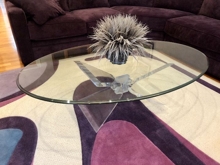 Mid-Century Modern coffee table with Lucite base and glass. 