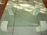 4-CORNER STONE & GLASS COCKTAIL TABLE