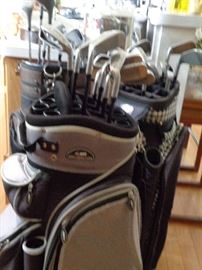 more golf clubs & bags