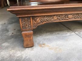 Hand carved designs on Romweber Viking Oak Collection coffee table 